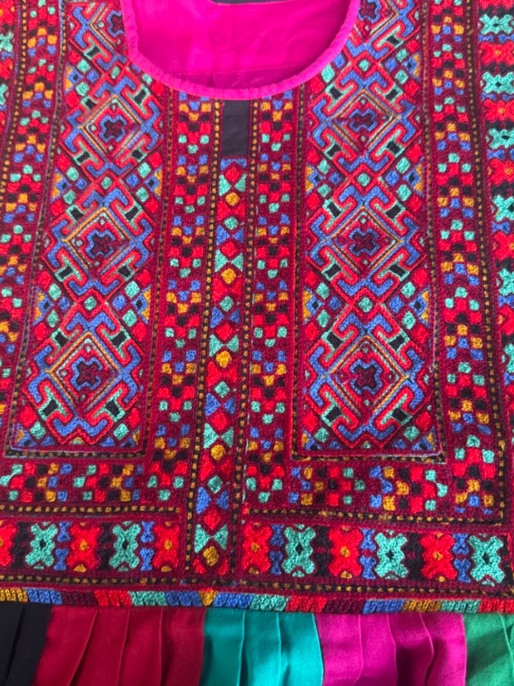 Hand-embroidered Balochi-style dress, likely Pakistani or Afghan origin.